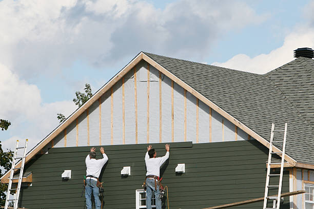 Professional Siding Repair technician working in Eure, NC